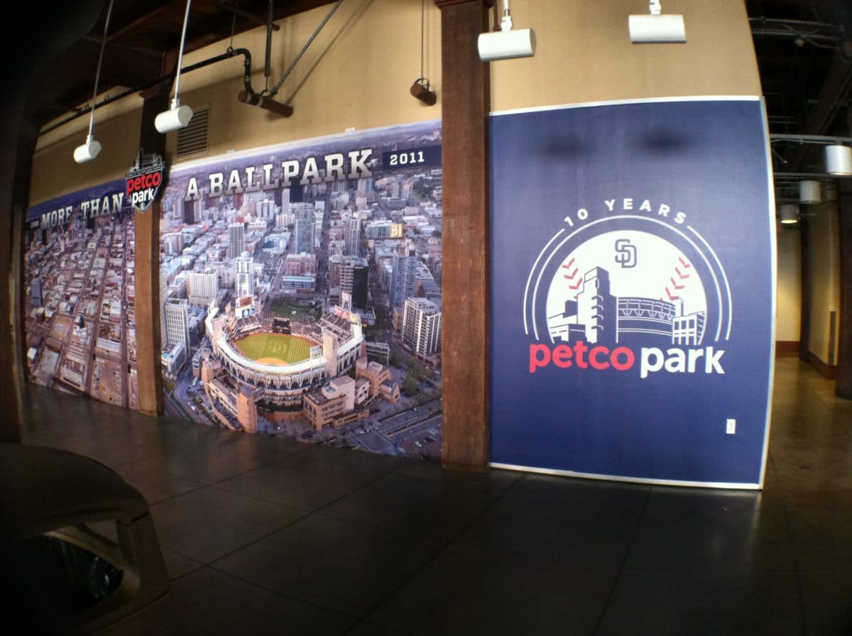 Custom wall mural featuring an aerial view of Petco Park and the surrounding San Diego skyline, celebrating the 10th anniversary of the stadium.