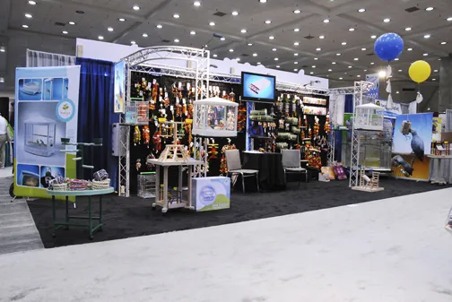 Expert signage installation team at a trade show, showcasing efficient booth setup